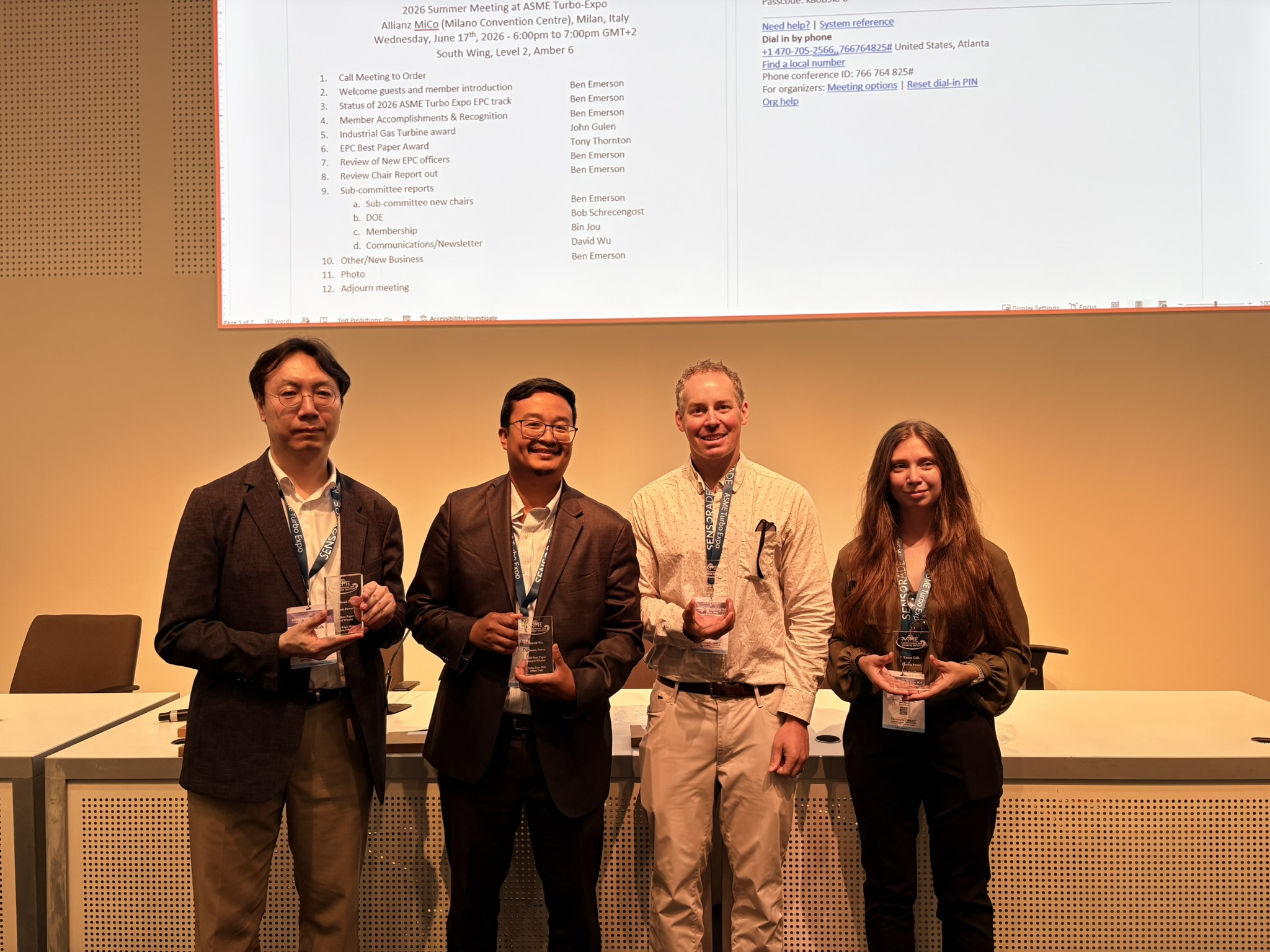 J-K Park, David Wu, Ben Emerson, and Renee Cole accept a best paper award at the EPC committee meeting